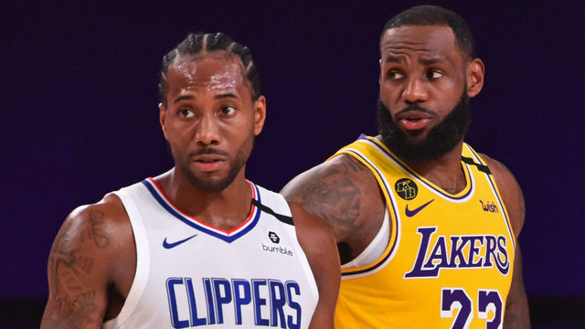 Orlando, FL - JULY 30: Kawhi Leonard #2 of the LA Clippers and LeBron James #23 of the Los Angeles Lakers look on during the game on July 30, 2020 at The Arena at ESPN Wide World Of Sports Complex in Orlando, Florida. NOTE TO USER: User expressly acknowledges and agrees that, by downloading and/or using this Photograph, user is consenting to the terms and conditions of the Getty Images License Agreement. Mandatory Copyright Notice: Copyright 2020 NBAE