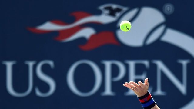 Czech Republic's Tomas Berdych serves the ball to Ryan Harrison of the US during their 2017 US Open Men's Singles match at the USTA Billie Jean King National Tennis Center in New York on August 30, 2017. / AFP PHOTO / Jewel SAMAD