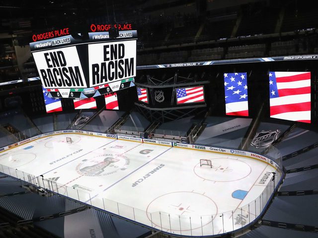 EDMONTON, ALBERTA - AUGUST 26: "End Racism" is displayed on the scoreboard in light of the recent events in Kenosha, Wisconsin, in regards to the shooting of Jacob Blake, prior to Game Three of the Western Conference Second Round during the 2020 NHL Stanley Cup Playoffs at Rogers Place on August 26, 2020 in Edmonton, Alberta.