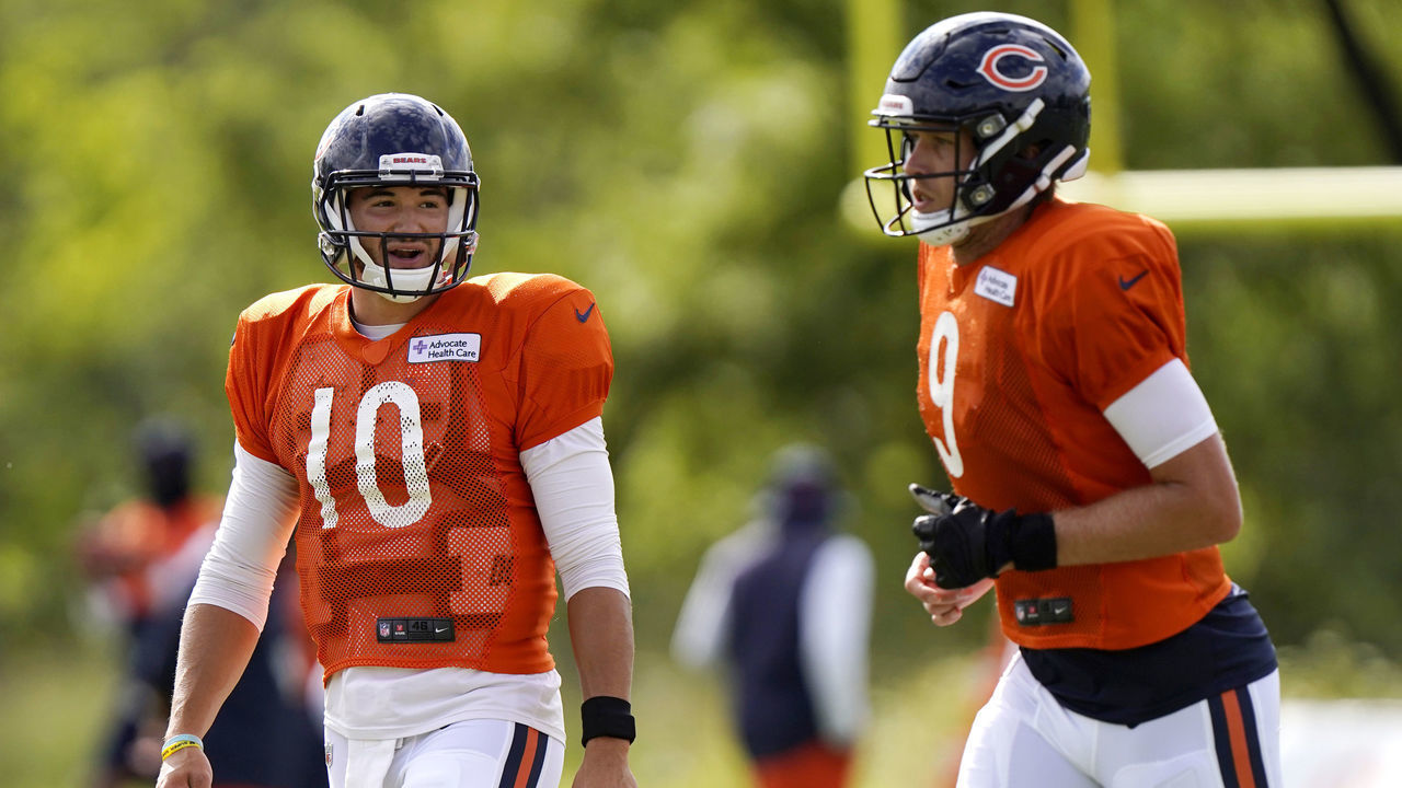 LAKE FOREST, ILLINOIS - AUGUST 18: Mitchell Trubisky #10 of the Chicago Bears talks with Nick Foles #9 during training camp at Halas Hall on August 18, 2020 in Lake Forest, Illinois.