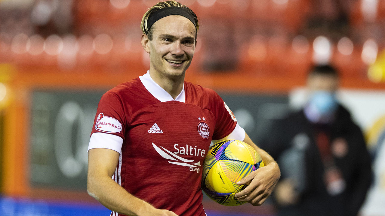 Aberdeen, SCOTLAND - AUGUST 27: Aberdeen's Ryan Hedges with the match ball at full time during the UEFA Europa League First Round Quaifier between Aberdeen and NSI Runavik at Pittodrie Stadium on August 27, 2020, in Aberdeen, Scotland.
