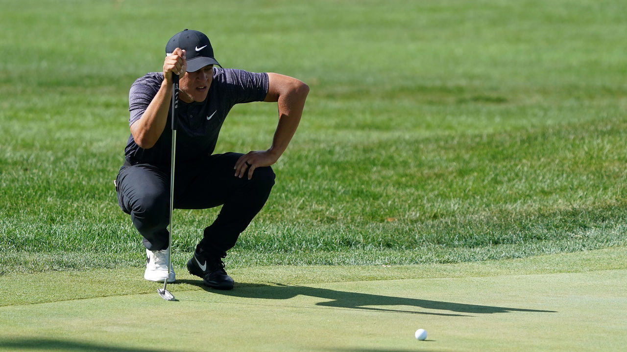 OLYMPIA FIELDS, ILLINOIS - AUGUST 27: Cameron Champ of the United States lines up a putt on the 18th green during the first round of the BMW Championship on the North Course at Olympia Fields Country Club on August 27, 2020 in Olympia Fields, Illinois.