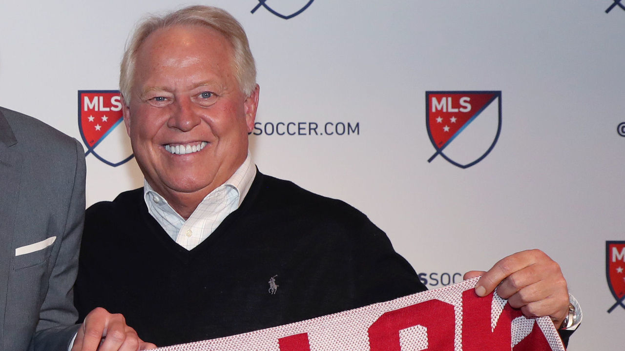 PHILADELPHIA, PA - JANUARY 19: Ricky Lopez-Espin was taken with the 33rd overall pick by Real Salt Lake with head coach Mike Petke (left) and team owner Dell Loy Hansen (right) during the MLS SuperDraft 2018 on January 19, 2018, at the Pennsylvania Convention Center in Philadelphia, PA.