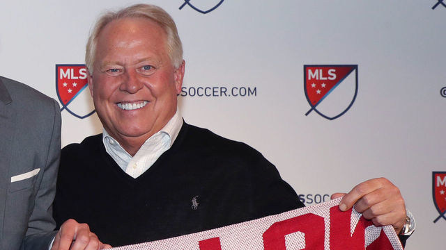 PHILADELPHIA, PA - JANUARY 19: Ricky Lopez-Espin was taken with the 33rd overall pick by Real Salt Lake with head coach Mike Petke (left) and team owner Dell Loy Hansen (right) during the MLS SuperDraft 2018 on January 19, 2018, at the Pennsylvania Convention Center in Philadelphia, PA.