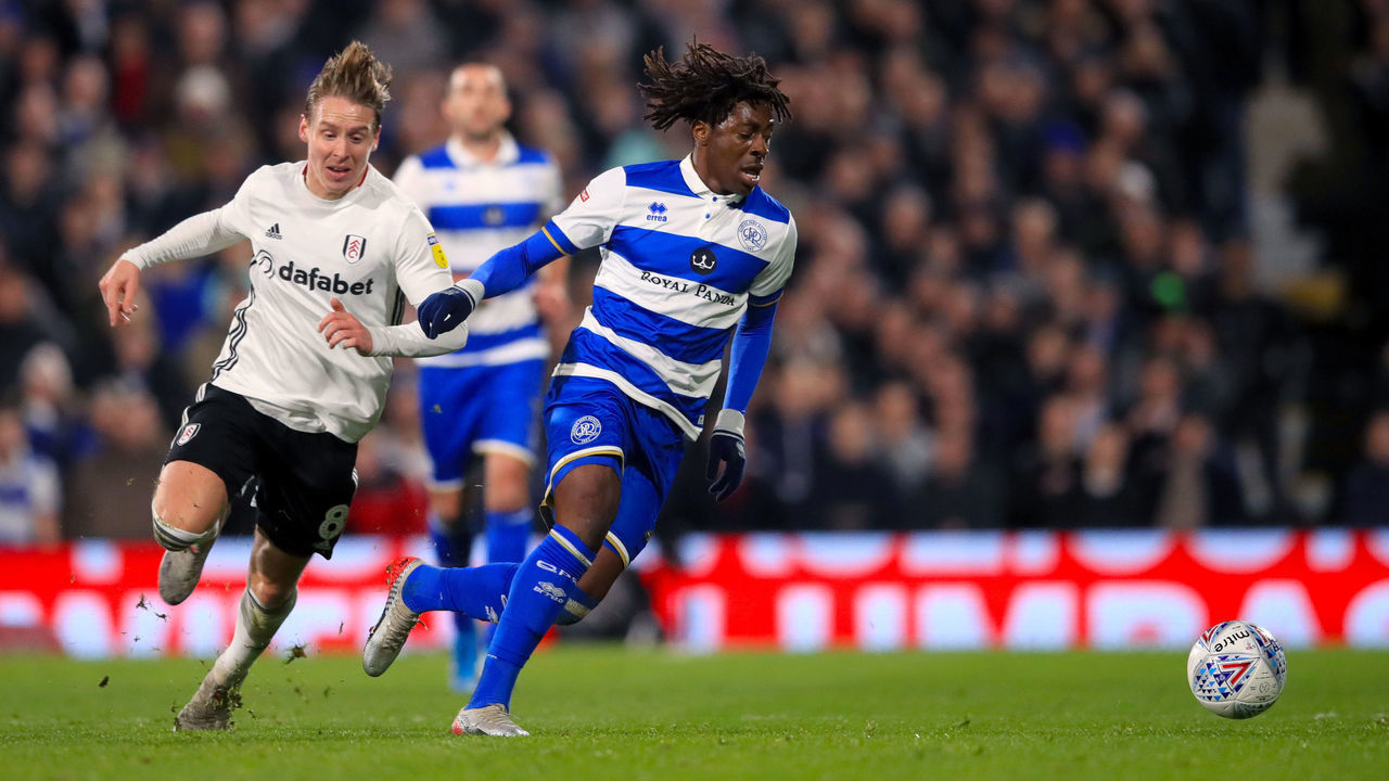 Fulham's Stefan Johansen (left) and Queens Park Rangers' Eberechi Eze battle for the ball during the Sky Bet Championship match at Craven Cottage, London.