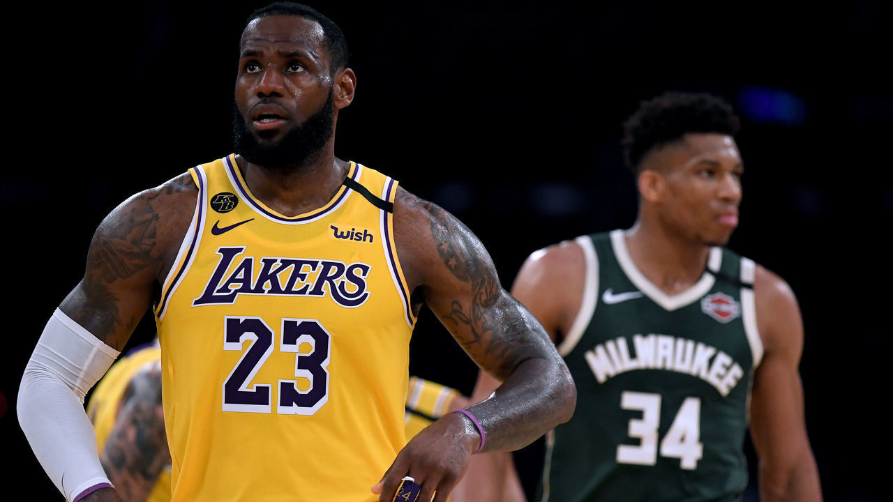 LOS ANGELES, CALIFORNIA - MARCH 06: LeBron James #23 of the Los Angeles Lakers reacts after his basket in front of Giannis Antetokounmpo #34 of the Milwaukee Bucks at Staples Center on March 06, 2020 in Los Angeles, California.