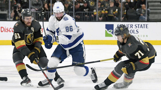 LAS VEGAS, NEVADA - FEBRUARY 20: Mark Stone #61 of the Vegas Golden Knights, Nikita Kucherov #86 of the Tampa Bay Lightning and William Karlsson #71 of the Golden Knights fight for the puck in the third period of their game at T-Mobile Arena on February 20, 2020 in Las Vegas, Nevada. The Golden Knights defeated the Lightning 5-3.