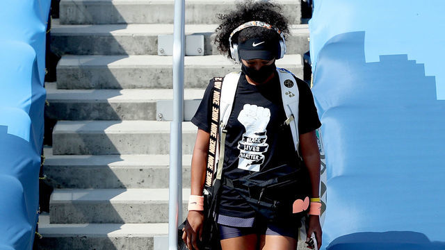 NEW YORK, NEW YORK - AUGUST 28: Naomi Osaka of Japan makes her way to the court for her semifinal match against Elise Mertens of Belgium during the Western & Southern Open at the USTA Billie Jean King National Tennis Center on August 28, 2020 in the Queens borough of New York City.