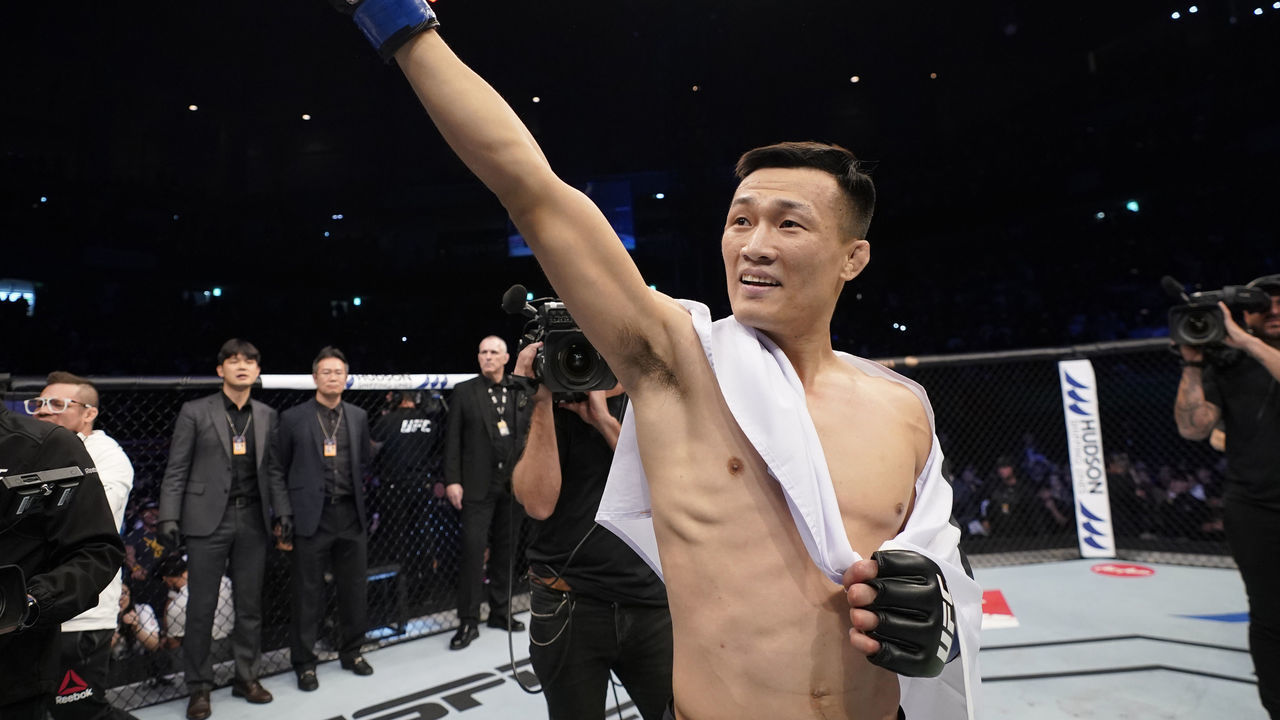BUSAN, SOUTH KOREA - DECEMBER 21: Chan Sung Jung of South Korea celebrates after knocking out Frankie Edgar in their featherweight fight during the UFC Fight Night event at Sajik Arena 3 on December 21, 2019 in Busan, South Korea.