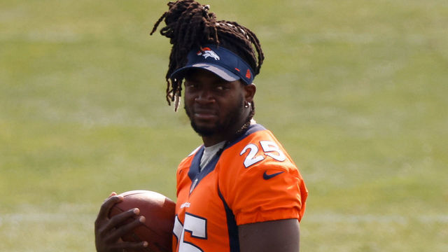 ENGLEWOOD, CO - AUGUST 21: Running back Melvin Gordon #25 of the Denver Broncos walks on the field but is not participating in drills during a training session at UCHealth Training Center on August 21, 2020 in Englewood, Colorado.