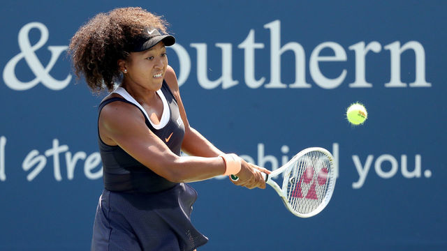 NEW YORK, NEW YORK - AUGUST 28: Naomi Osaka of Japan returns a shot to Elise Mertens of Belgium during the Western & Southern Open at the USTA Billie Jean King National Tennis Center on August 28, 2020 in the Queens borough of New York City.