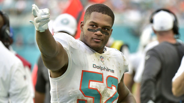 MIAMI, FL - NOVEMBER 03: Raekwon McMillan #52 of the Miami Dolphins makes a first down signal during the fourth quarter of the game against the New York Jets at Hard Rock Stadium on November 3, 2019 in Miami, Florida.