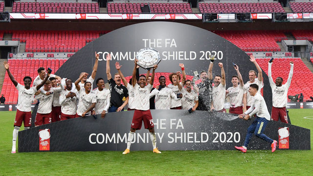 LONDON, ENGLAND - AUGUST 29: Pierre-Emerick Aubameyang of Arsenal lifts the Community Shield Trophy following his team's victory in during the FA Community Shield final between Arsenal and Liverpool at Wembley Stadium on August 29, 2020 in London, England.
