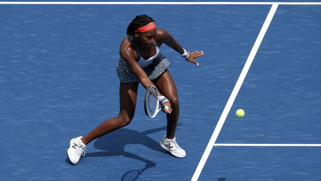 NEW YORK, NEW YORK - AUGUST 22: Cori (Coco) Gauff of the United States returns a shot against Maria Sakkari of Greece during their Women's Singles First Round match on day three of the 2020 Western & Southern Open at USTA Billie Jean King National Tennis Center on August 22, 2020 in the Queens borough of New York City.