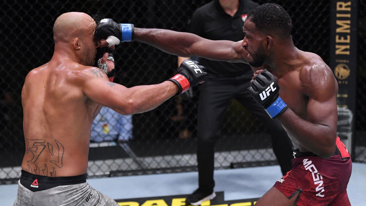 LAS VEGAS, NEVADA - AUGUST 29: (R-L) Neil Magny punches Robbie Lawler in their welterweight fight during the UFC Fight Night event at UFC APEX on August 29, 2020 in Las Vegas, Nevada.