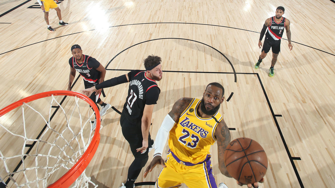 ORLANDO, FL - AUGUST 29: LeBron James #23 of the Los Angeles Lakers shoots the ball against the Portland Trail Blazers during Round One, Game Five of the NBA Playoffs on August 29, 2020 at the AdventHealth Arena at ESPN Wide World Of Sports Complex in Orlando, Florida. NOTE TO USER: User expressly acknowledges and agrees that, by downloading and/or using this Photograph, user is consenting to the terms and conditions of the Getty Images License Agreement. Mandatory Copyright Notice: Copyright 2020 NBAE