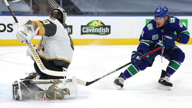 EDMONTON, ALBERTA - AUGUST 29: Adam Gaudette #88 of the Vancouver Canucks attempts a tip in but went wide past goaltender Robin Lehner #90 of the Vegas Golden Knights during the first period of Game Three of the Western Conference Second Round during the 2020 NHL Stanley Cup Playoffs at Rogers Place on August 29, 2020 in Edmonton, Alberta.