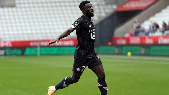REIMS, FRANCE - AUGUST 30: Jonathan Bamba of Lille celebrates after scoring 1st goal during the Ligue 1 match between Stade Reims and Lille OSC at Stade Auguste Delaune on August 30, 2020 in Reims, France.