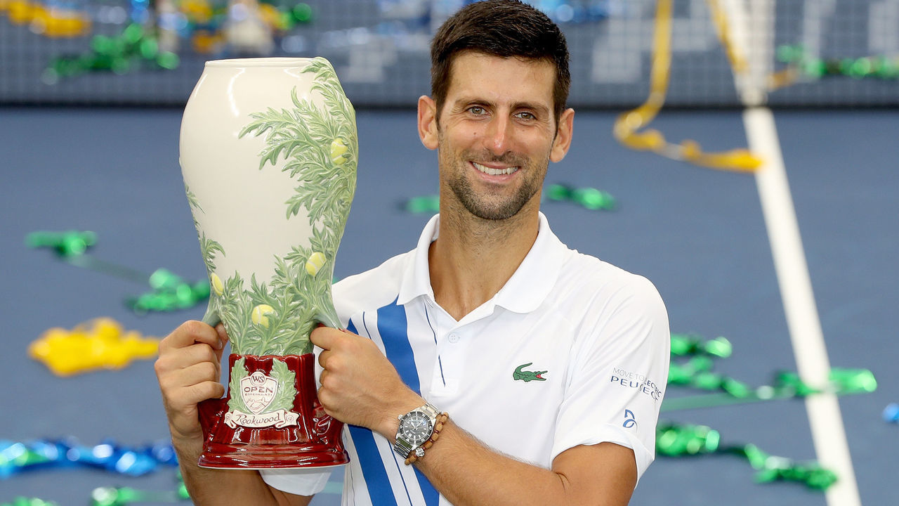 NEW YORK, NEW YORK - AUGUST 29: Novak Djokovic of Serbia poses with the winner's trophy after defeating Milos Raonic of Canada in the men's singles final of the Western & Southern Open at the USTA Billie Jean King National Tennis Center on August 29, 2020 in the Queens borough of New York City.