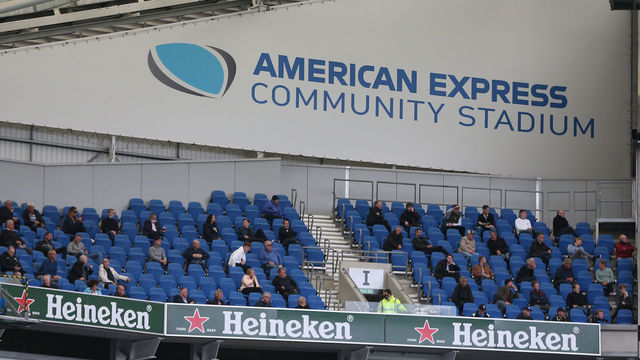 BRIGHTON, ENGLAND - AUGUST 29: Fans in the stands watch the match as part of a pilot event following the coronavirus pandemic during the pre-season friendly match at Amex Stadium on August 29, 2020 in Brighton, England. A limited number of spectators will be in attendance as covid 19 pandemic restrictions are eased.