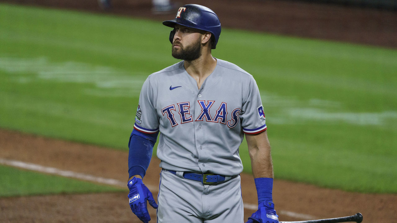 SEATTLE, WA - AUGUST 21: Joey Gallo #13 of the Texas Rangers walks off the field after an at-bat in a game against the Seattle Mariners at T-Mobile Park on August, 21, 2020 in Seattle, Washington. The Mariners won 7-4.