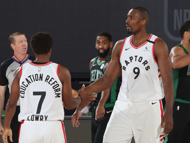 ORLANDO, FL - AUGUST 30: Kyle Lowry #7 high-fives Serge Ibaka #9 of the Toronto Raptors during Game One of the Eastern Conference SemiFinals of the NBA Playoffs on August 30, 2020 at The Field House in Orlando, Florida. NOTE TO USER: User expressly acknowledges and agrees that, by downloading and/or using this Photograph, user is consenting to the terms and conditions of the Getty Images License Agreement. Mandatory Copyright Notice: Copyright 2020 NBAE