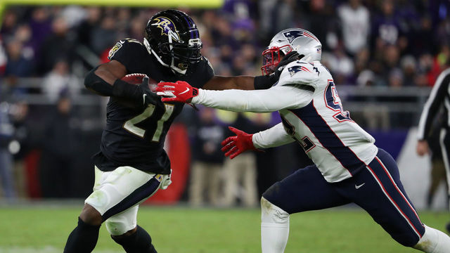 BALTIMORE, MARYLAND - NOVEMBER 03: Running Back Mark Ingram #21 of the Baltimore Ravens carries the ball during the second half against the New England Patriots at M&T Bank Stadium on November 03, 2019 in Baltimore, Maryland.