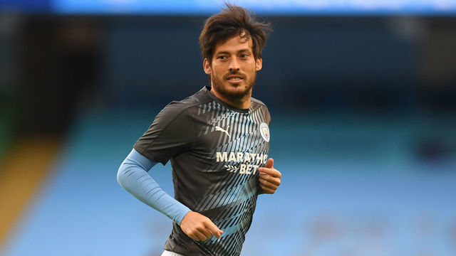 MANCHESTER, ENGLAND - JUNE 22: David Silva of Manchester City warms up ahead of the Premier League match between Manchester City and Burnley FC at Etihad Stadium on June 22, 2020 in Manchester, England. Football stadiums around Europe remain empty due to the Coronavirus Pandemic as Government social distancing laws prohibit fans inside venus resulting in all fixtures being played behind closed doors.