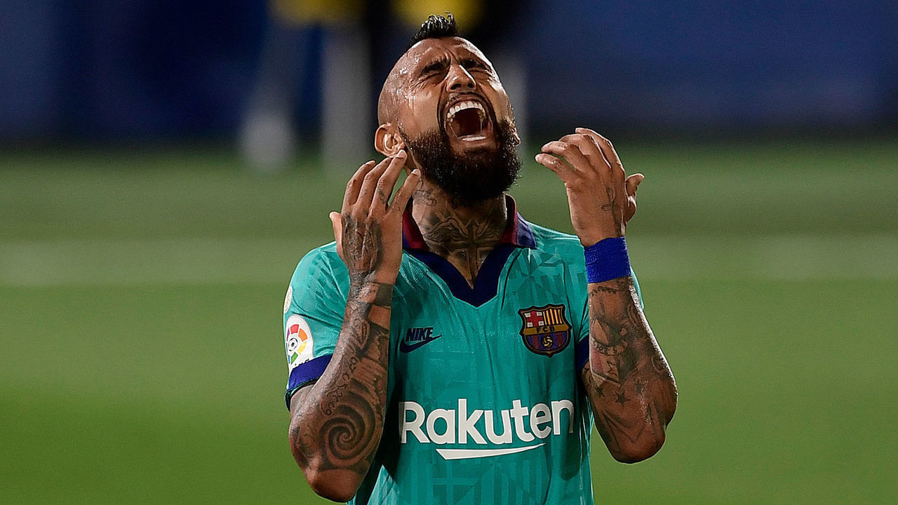Barcelona's Chilean midfielder Arturo Vidal reacts after missing a goal opportunity during the Spanish League football match between Villarreal and Barcelona at the Madrigal stadium in Villarreal on July 5, 2020.