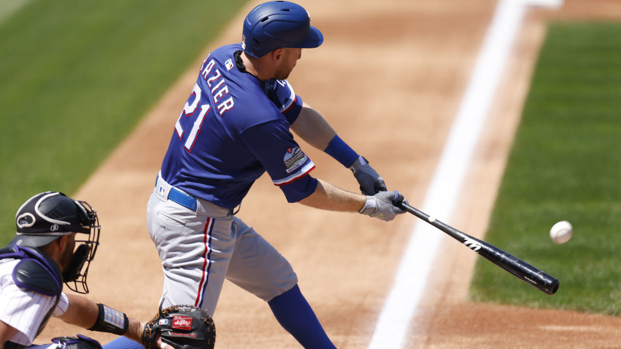 DENVER, CO - AUGUST 16: Todd Frazier #21 of the Texas Rangers hits a double during the second inning against the Colorado Rockies at Coors Field on August 16, 2020 in Denver, Colorado.