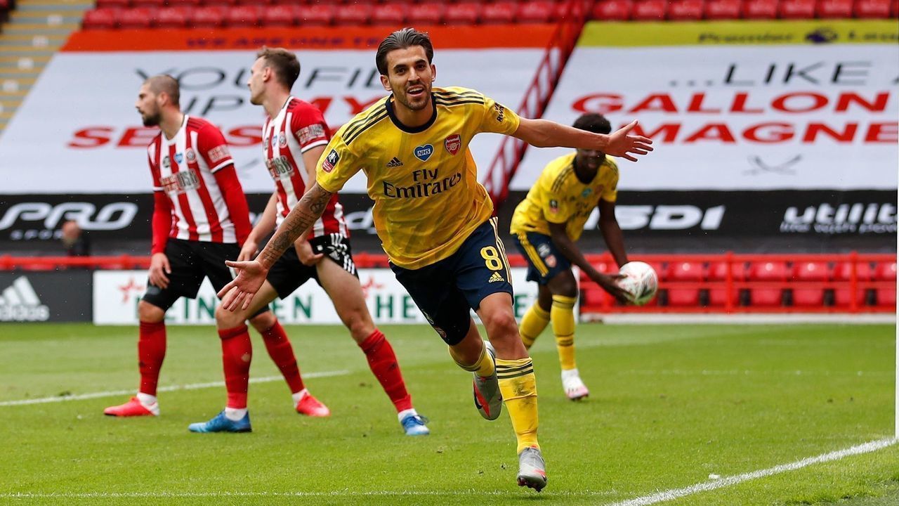 Arsenal's Spanish midfielder Dani Ceballos (C) runs to celebrate scoring a goal during the English FA Cup quarter-final football match between Sheffield United and Arsenal at Bramall Lane in Sheffield, northern England on June 28, 2020.