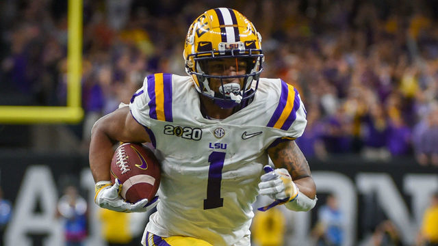 NEW ORLEANS, LA - JANUARY 13: LSU Tigers wide receiver Ja'Marr Chase (1) finds open field after a pass reception during the CFP National Championship game between the LSU Tigers and Clemson Tigers at the Mercedes-Benz Superdome on January 13, 2020 in New Orleans, LA.