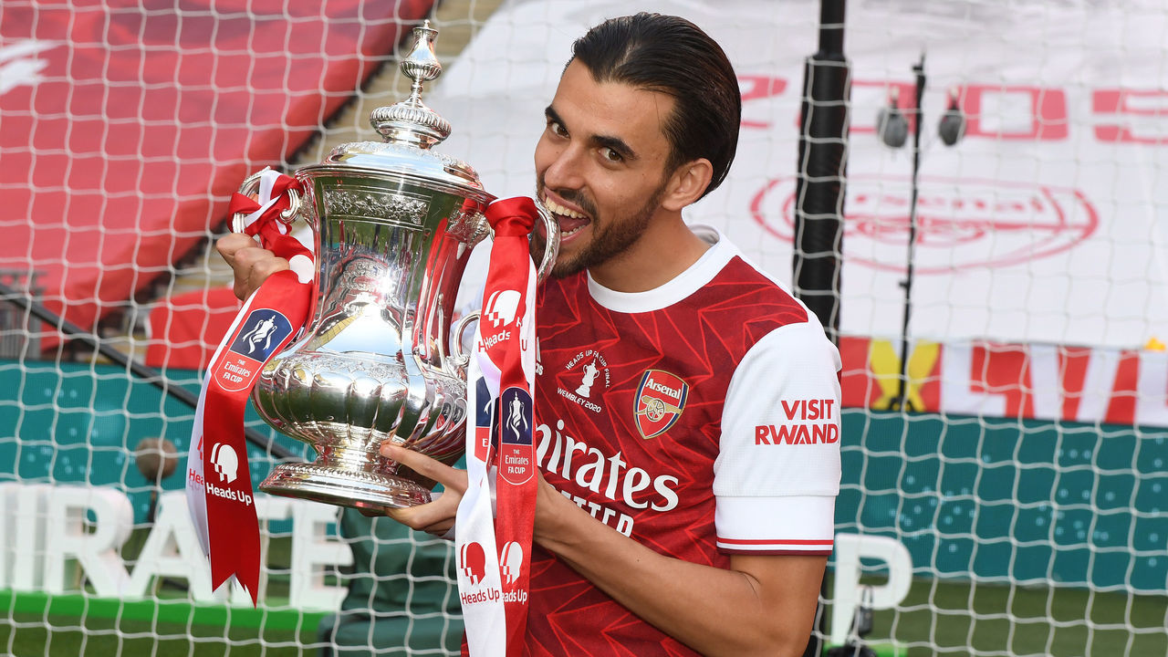 LONDON, ENGLAND - AUGUST 01: Dani Ceballos of Arsenal celebrates after the FA Cup Final match between Arsenal and Chelsea at Wembley Stadium on August 01, 2020 in London, England. Football Stadiums around Europe remain empty due to the Coronavirus Pandemic as Government social distancing laws prohibit fans inside venues resulting in all fixtures being played behind closed doors.