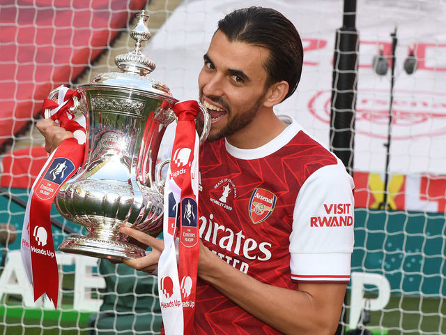 LONDON, ENGLAND - AUGUST 01: Dani Ceballos of Arsenal celebrates after the FA Cup Final match between Arsenal and Chelsea at Wembley Stadium on August 01, 2020 in London, England. Football Stadiums around Europe remain empty due to the Coronavirus Pandemic as Government social distancing laws prohibit fans inside venues resulting in all fixtures being played behind closed doors.