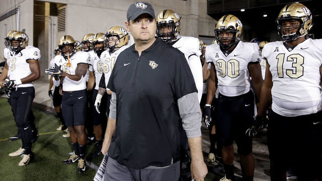 CINCINNATI, OH - OCTOBER 04: Head coach Josh Heupel of the Central Florida Knights gets ready to lead his team to the field before the game against the Cincinnati Bearcats at Nippert Stadium on October 4, 2019 in Cincinnati, Ohio. Cincinnati defeated Central Florida 27-24.