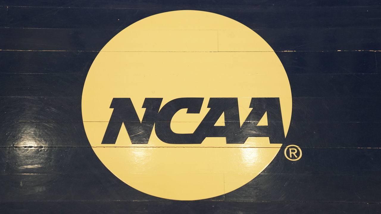 WASHINGTON, DC - MARCH 03: The NCAA logo on the floor during a Atlantic 10 Women's Basketball Tournament - First Round college basketball game between the Richmond Spiders and the George Washington Colonials at the Smith Center on March 3, 2020 in Washington, DC.