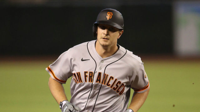 PHOENIX, ARIZONA - AUGUST 30: Alex Dickerson #42 of the San Francisco Giants rounds the bases after hitting a solo home run against the Arizona Diamondbacks during the first inning of the MLB game at Chase Field on August 30, 2020 in Phoenix, Arizona. All uniformed players and coaches are wearing #42 in honor of Jackie Robinson Day. The day honoring Jackie Robinson, traditionally held on April 15, was rescheduled due to the COVID-19 pandemic.