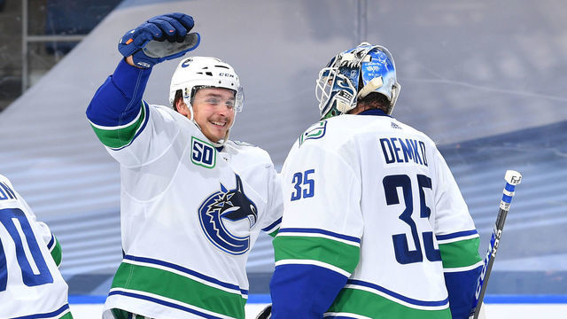 EDMONTON, ALBERTA - SEPTEMBER 01: Goaltender Thatcher Demko #35 of the Vancouver Canucks is congratulated by teammate Jake Virtanen #18 after their 2-1 win in Game Five of the Western Conference Second Round of the 2020 NHL Stanley Cup Playoff between the Vancouver Canucks and the Vegas Golden Knights at Rogers Place on September 01, 2020 in Edmonton, Alberta.