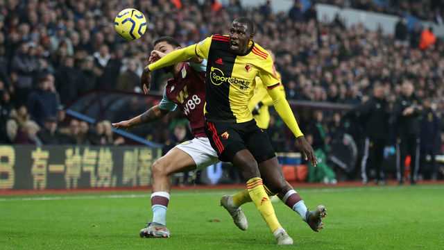 Watford's Abdoulaye Doucoure (right)