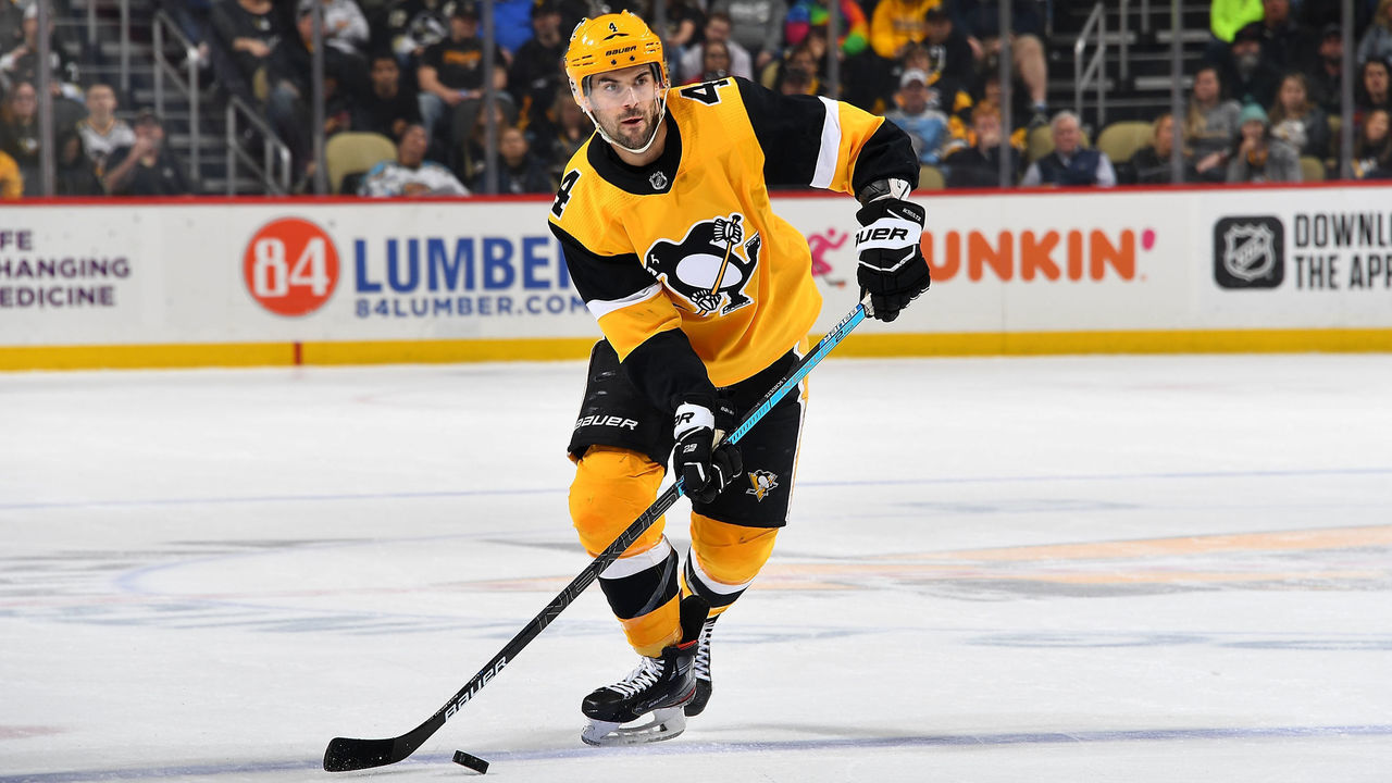 PITTSBURGH, PA - MARCH 08: Justin Schultz #4 of the Pittsburgh Penguins skates against the Carolina Hurricanes at PPG PAINTS Arena on March 8, 2020 in Pittsburgh, Pennsylvania.