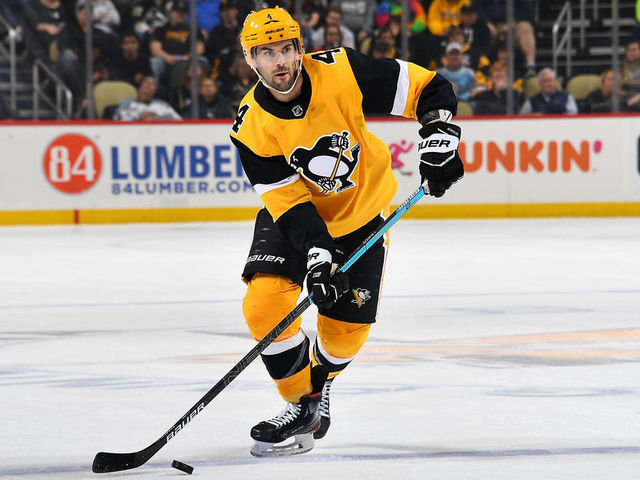 PITTSBURGH, PA - MARCH 08: Justin Schultz #4 of the Pittsburgh Penguins skates against the Carolina Hurricanes at PPG PAINTS Arena on March 8, 2020 in Pittsburgh, Pennsylvania.