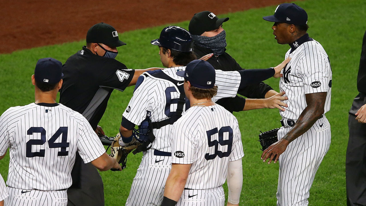 NEW YORK, NEW YORK - SEPTEMBER 01: Aroldis Chapman #54 of the New York Yankees exchanges words with the Tampa Bay Rays after the final out in the ninth inning at Yankee Stadium on September 01, 2020 in New York City.
