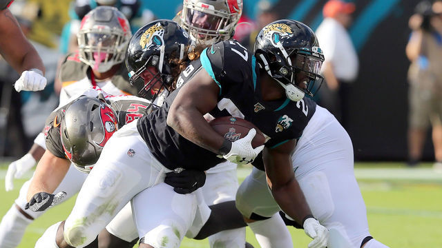 JACKSONVILLE, FL - DECEMBER 01: Leonard Fournette (27) of the Jaguars runs the ball during the regular season game between the Tampa Bay Buccaneers and the Jacksonville Jaguars on December 01, 2019 at TIAA Bank Field in Jacksonville, FL.