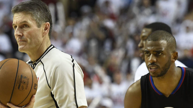 PORTLAND, OR - APRIL 23: Chris Paul #3 of the Los Angeles Clippers glares at referee Scott Foster #48 after receiving a technical foul in the third quarter of Game Three of the Western Conference Quarterfinals during the 2016 NBA Playoffs at the Moda Center on April 23, 2016 in Portland, Oregon. The Blazers won the game 96-88. NOTE TO USER: User expressly acknowledges and agrees that by downloading and/or using this photograph, user is consenting to the terms and conditions of the Getty Images License Agreement.