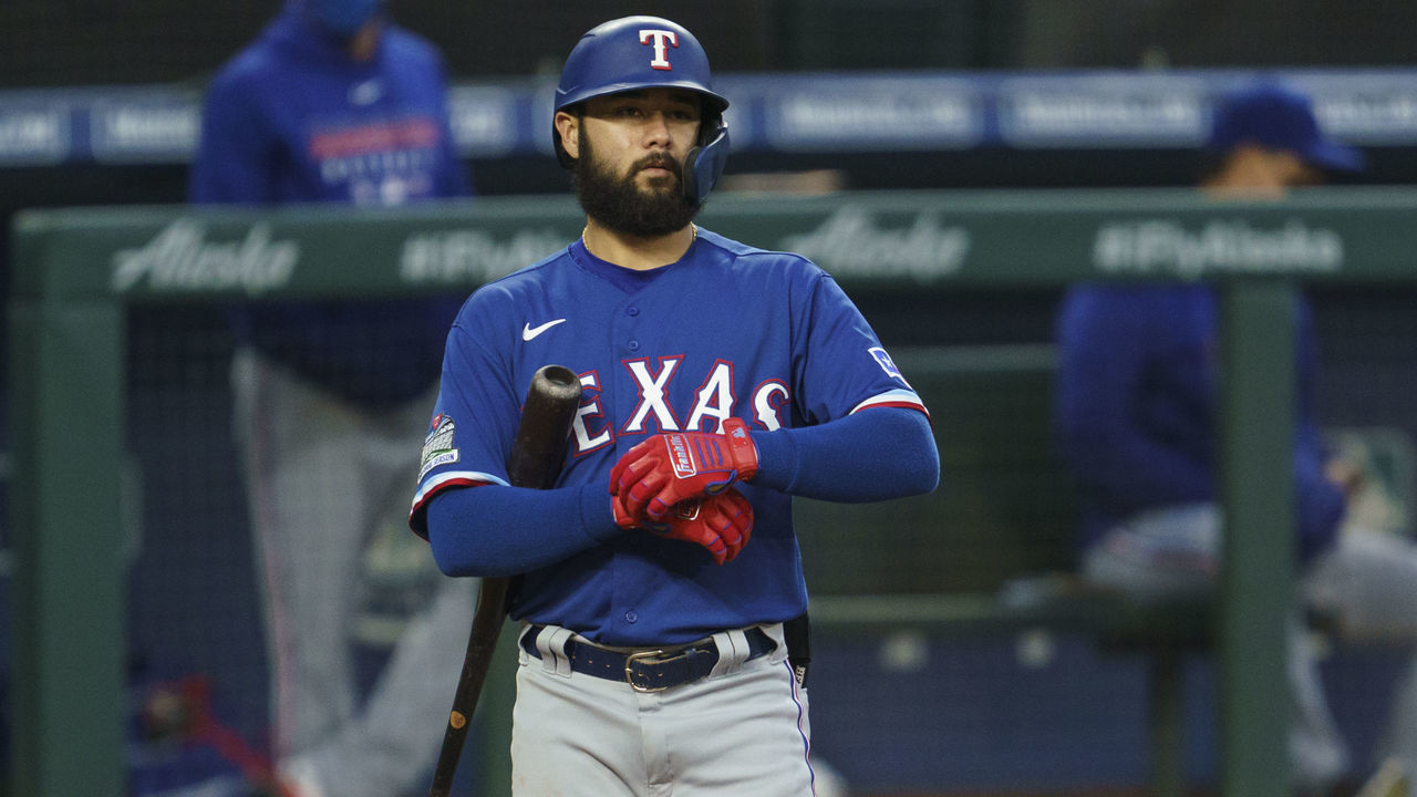SEATTLE, WA - AUGUST 22: Isiah Kiner-Falefa #9 of the Texas Rangers adjusts his batting gloves between pitches during an at-bat in a game against the Seattle Mariners at T-Mobile Park on August, 22, 2020 in Seattle, Washington. The Mariners won 10-1.