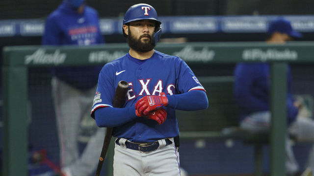 SEATTLE, WA - AUGUST 22: Isiah Kiner-Falefa #9 of the Texas Rangers adjusts his batting gloves between pitches during an at-bat in a game against the Seattle Mariners at T-Mobile Park on August, 22, 2020 in Seattle, Washington. The Mariners won 10-1.