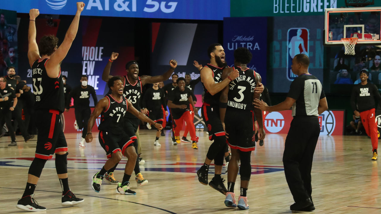 Orlando, FL - SEPTEMBER 3: The Toronto Raptors celebrate after OG Anunoby #3 of the Toronto Raptors shoots the game winning shot during the game against the Toronto Raptors during Game Three of the Eastern Conference Semifinals on September 3, 2020 in Orlando, Florida at The Field House. NOTE TO USER: User expressly acknowledges and agrees that, by downloading and/or using this Photograph, user is consenting to the terms and conditions of the Getty Images License Agreement. Mandatory Copyright Notice: Copyright 2020 NBAE