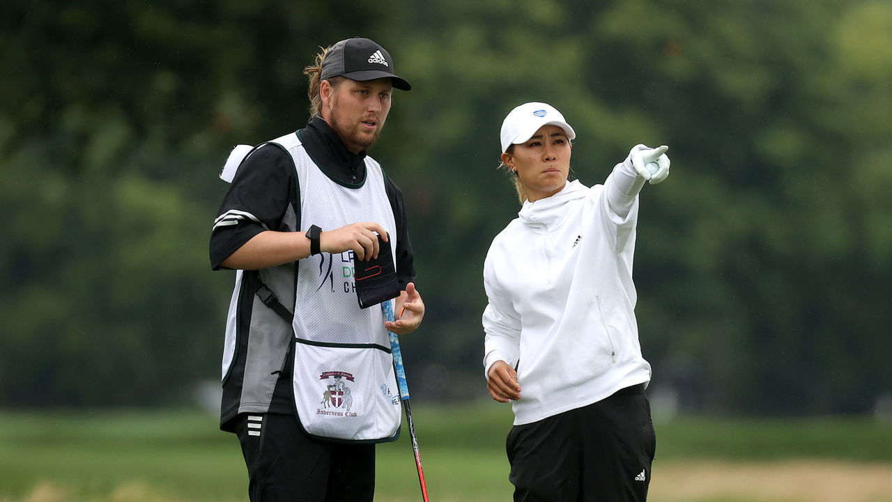 TOLEDO, OHIO - AUGUST 02: Danielle Kang prepares for her shot from the sixth tee with her caddie, Oliver Brett, during the final round of the LPGA Drive On Championship at Inverness Club on August 2, 2020 in Toledo, Ohio.