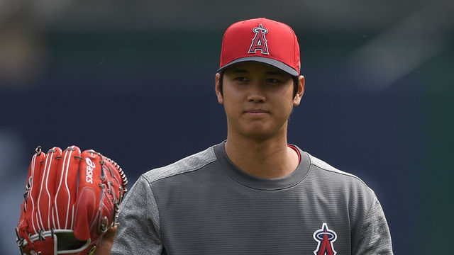 OAKLAND, CA - MARCH 31: Shohei Ohtani #17 of the Los Angeles Angels of Anaheim walks off the field after playing catch prior to the start of a Major League Baseball game against the Oakland Athletics at Oakland Alameda Coliseum on March 31, 2018 in Oakland, California.