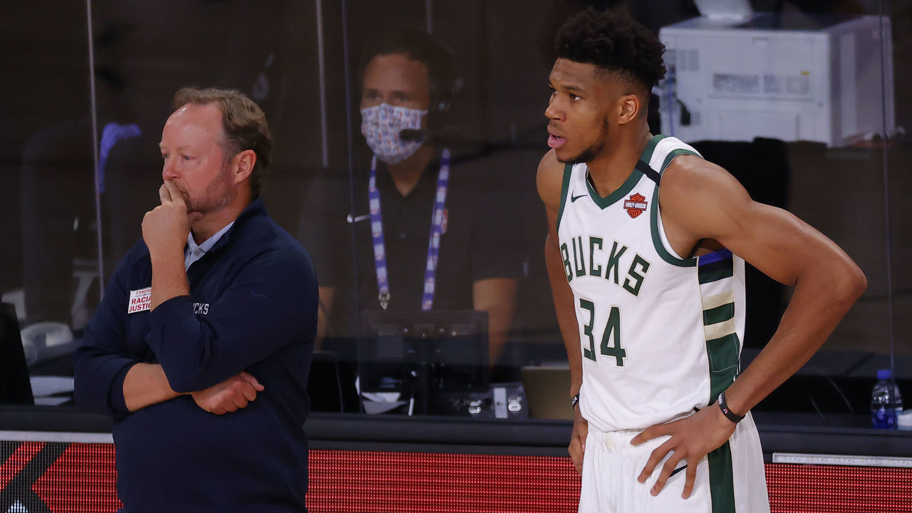 LAKE BUENA VISTA, FLORIDA - AUGUST 29: Mike Budenholzer and Giannis Antetokounmpo #34 of the Milwaukee Bucks look on against the Orlando Magic during the fourth quarter in Game Five of the Eastern Conference First Round during the 2020 NBA Playoffs at AdventHealth Arena at ESPN Wide World Of Sports Complex on August 29, 2020 in Lake Buena Vista, Florida.